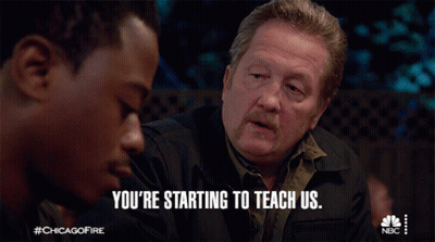 Man Says You're Starting To Teach Us Sitting Next To Another Man GIF