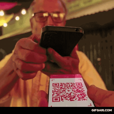 Man Scanning QR Code With Phone GIF