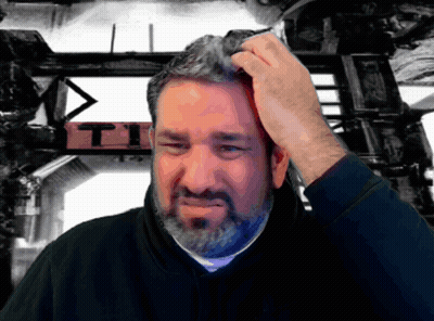 Man Scratching Head In Front Of T.I. Sign GIF