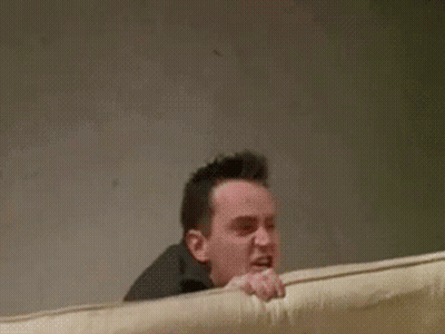 Man Screaming Holding Couch Saying Shut Up GIF