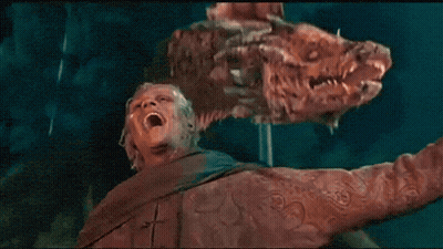 Man Screaming Holding Dragon On Back GIF