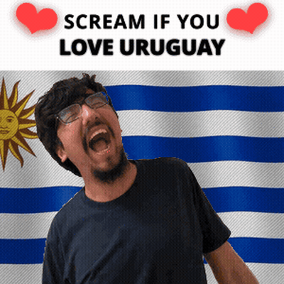 Man Screaming In Front Of Uruguay Flag GIF