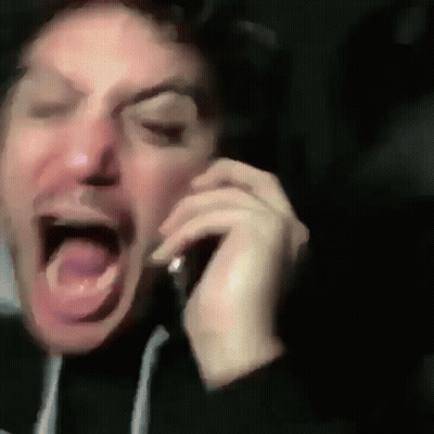 Man Screaming On Cell Phone GIF