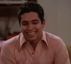 Man Shakes Head Laughing Then Crying GIF