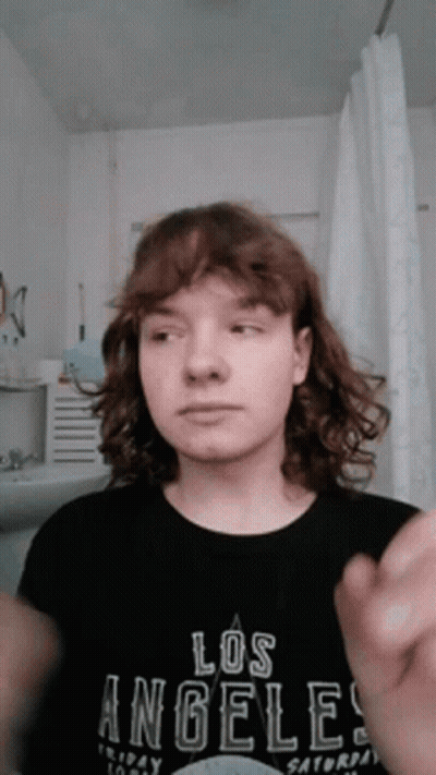 Man Shaving Face With Philips Razor GIF