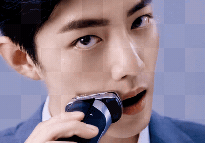 Man Shaving Face With Philips Razor GIF