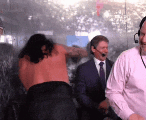 Man Shirtless Being Interviewed GIF