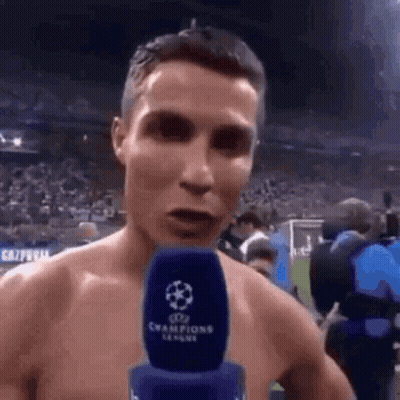 Man Shirtless Talking Into Microphone GIF