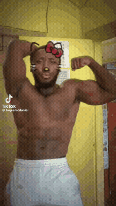 Man Shirtless Wearing Hello Kitty Mask GIF