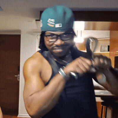Man Shirtless Wearing Miami Hat GIF