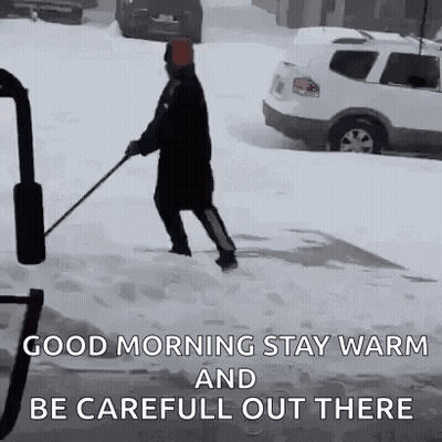 Man Shoveling Snow Beside Parked Car GIF