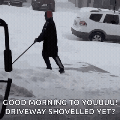 Man Shoveling Snow On Driveway GIF
