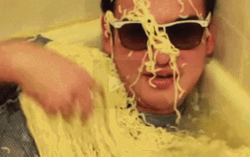 Man Showers With Noodle GIF