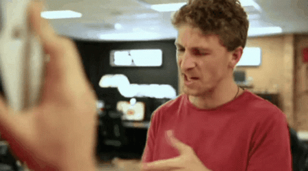 Man Showing Monopoly Money To Another Guy GIF