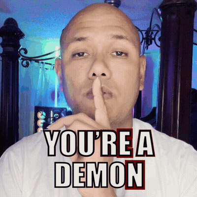Man Shushing With You're A Demon Behind Him GIF