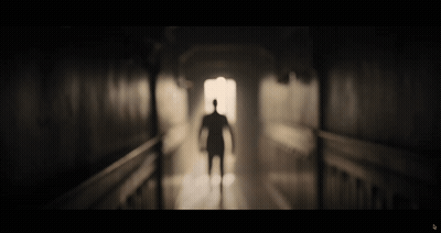 Man Silhouette Walking Hallway GIF