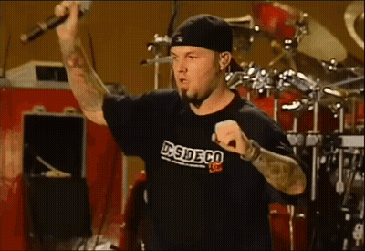 Man Singing Into Mic In DS Side Co T-Shirt GIF