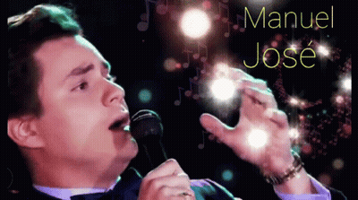 Man Singing Into Mic With Manuel Jose Background GIF