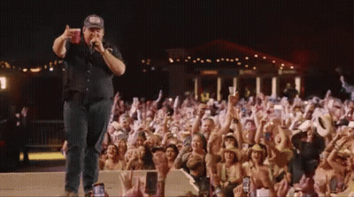 Man Singing Into Microphone GIF