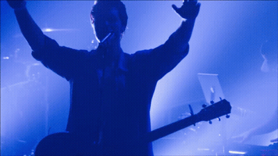 Man Singing Into Microphone GIF