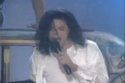 Man Singing Into Microphone GIF