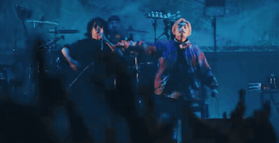 Man Singing Into Microphone GIF