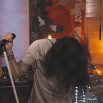 Man Singing Into Microphone GIF