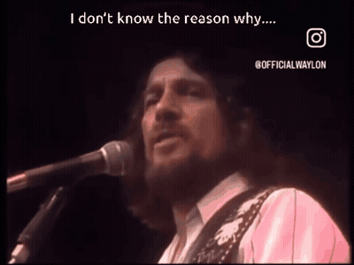 Man Singing Into Microphone And Playing Guitar GIF