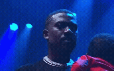 Man Singing Into Microphone Blue Light GIF