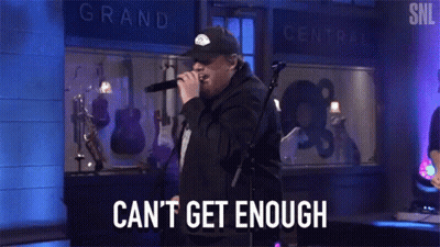 Man Singing Into Microphone Can't Get Enough GIF