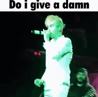 Man Singing Into Microphone Do I Give a Damn