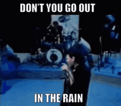 Man Singing Into Microphone Don't You Go Out In The Rain GIF