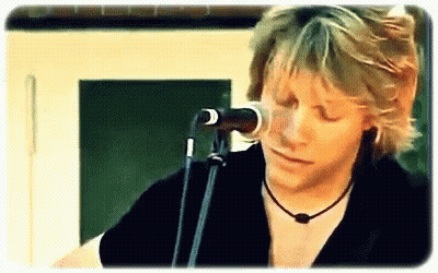 Man Singing Into Microphone Eyes Closed GIF