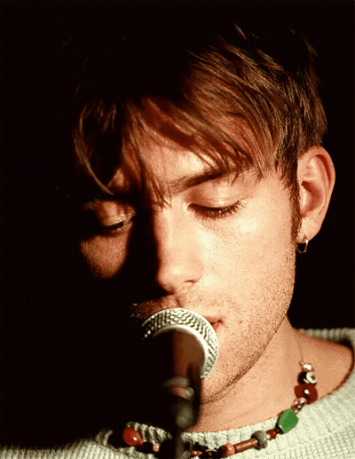 Man Singing Into Microphone Eyes Closed GIF