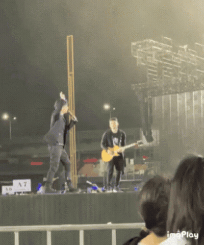 Man Singing Into Microphone GIF