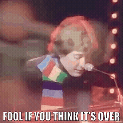 Man Singing Into Microphone Fool If You Think It's Over GIF