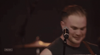 Man Singing Into Microphone GIF