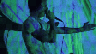Man Singing Into Microphone GIF