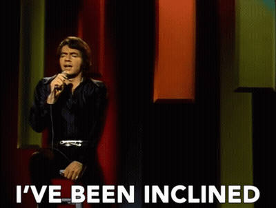 Man Singing Into Microphone I've Been Inclined GIF