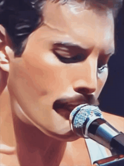 Man Singing Into Microphone GIF