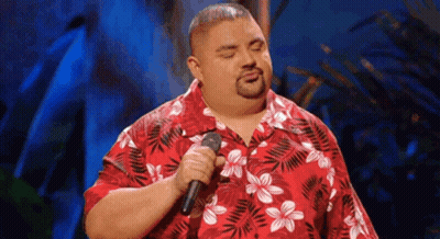 Man Singing Into Microphone In Red Hawaiian Shirt GIF