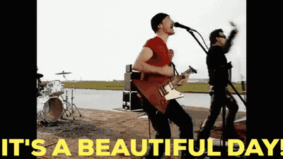 Man Singing Into Microphone It's A Beautiful Day GIF