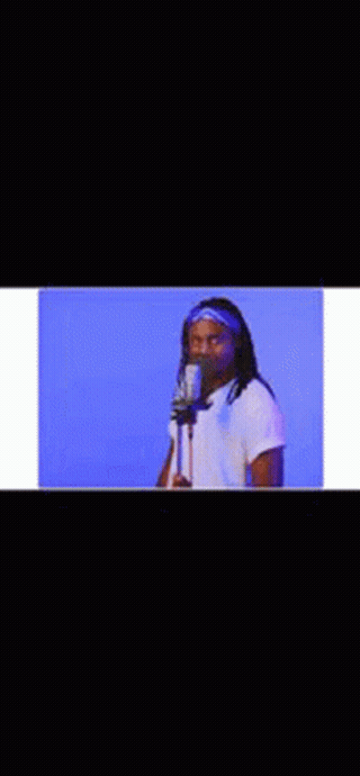 Man Singing Into Microphone GIF
