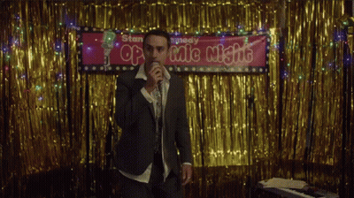 Man Singing Into Microphone GIF