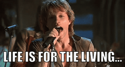 Man Singing Into Microphone Life Is For The Living GIF