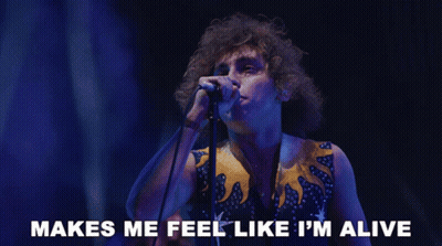 Man Singing Into Microphone Makes Me Feel Alive GIF