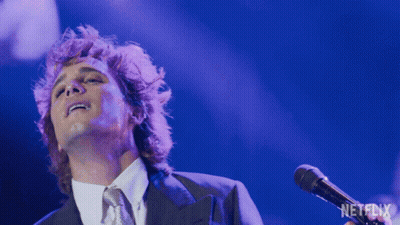Man Singing Into Microphone Netflix Logo GIF