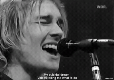 Man Singing Into Microphone GIF