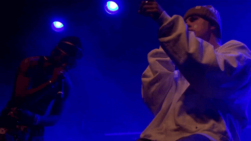 Man Singing Into Microphone GIF