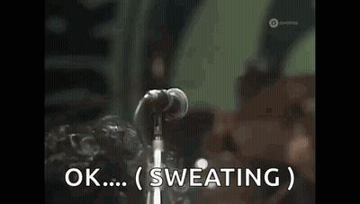 Man Singing Into Microphone Ok Sweating GIF